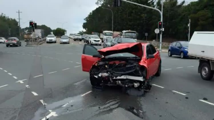 Chris' red Holden had to be taken away by a tow truck after the accident. Photo: Dash Cam Owners Australia