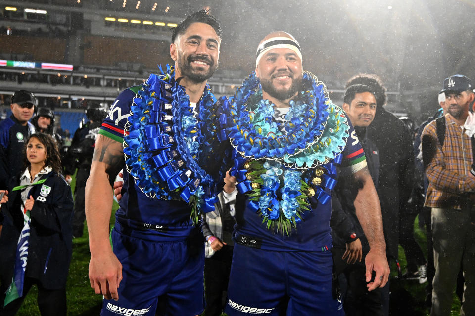 Shaun Johnson and Jazz Tevaga pose for a photo.