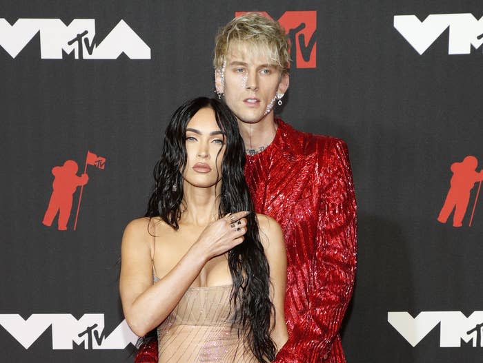 A closeup of Machine Gun Kelly and Megan