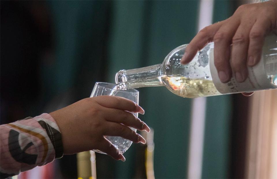 Wine is poured at the wine tasting area at the annual Grape Festival in Lodi. 