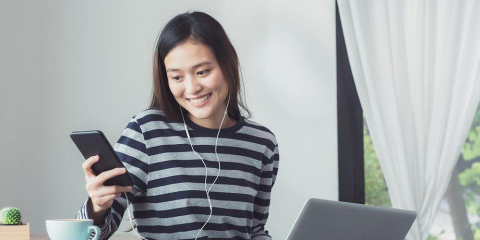 woman phone happy work computer laptop