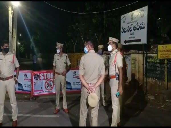 Police personnel around the CID office in Guntur where the YSRCP member was taken. (Photo/ANI)