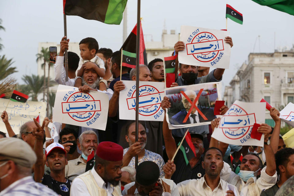 Hundreds of demonstrators protest in Tripoli, Libya, on Friday, Sept. 24, 2021, in opposition to the country’s parliament passing a vote of no-confidence in the transitional government. The motion, passed on Tuesday, represents a challenge to planned December elections and impedes efforts to unite the oil-rich North African nation after a decade of turmoil. (AP Photo/Yousef Murad)