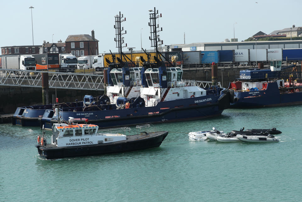 A Dover Pilot Harbour Patrol boat taking dingys out to sea.