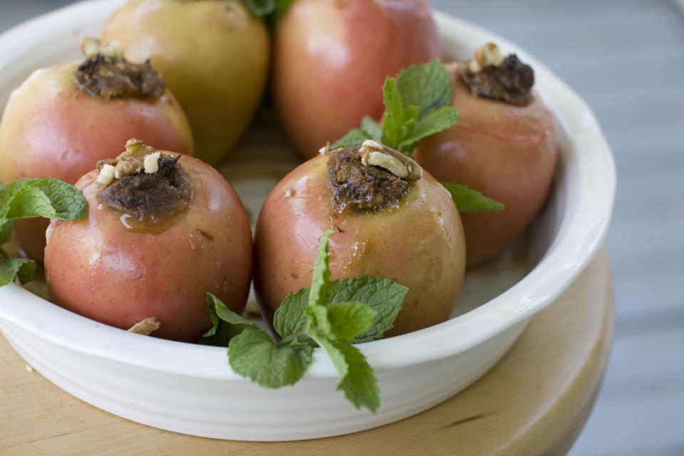 This July 29, 2013 photo shows baked honey date apples in Concord, N.H. (AP Photo/Matthew Mead)