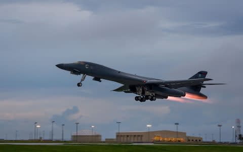 A US Air Force B-1B Lancer takes off from Andersen Air Force Base, Guam, amid moutning tensions with North Korea - Credit: JOSHUA SMOOT/AFP