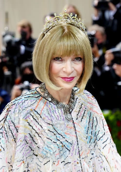 A closeup of Anna Wintour that shows her tiara