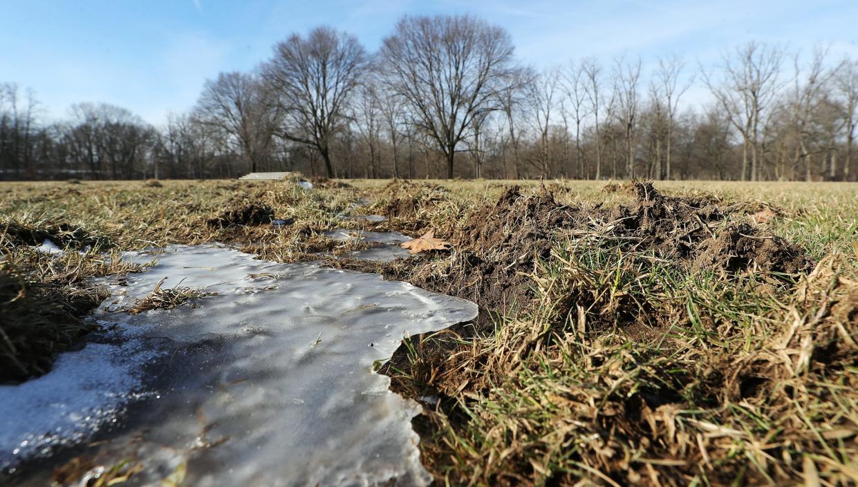 Snow and ice collect in tire tracks on Feb. 5, a little over a week after extensive playing field damage was discovered at Water Works Park in Cuyahoga Falls.