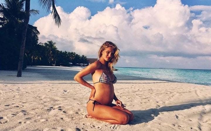 Rosie Huntington-Whiteley who has announced on Instagram that she and Jason Statham are expecting their first child.