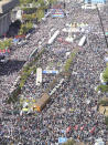 Demonstrators gather during a rally in Seoul, South Korea, Wednesday, Oct. 9, 2019. Thousands of protesters rallied Wednesday in South Korea's capital for the second consecutive week to call for the ouster of President Moon Jae-in's hand-picked justice minister, whose family is at the center of an investigation into allegations of financial crimes and academic favors. (Jin Yeon-soo/Yonhap via AP)