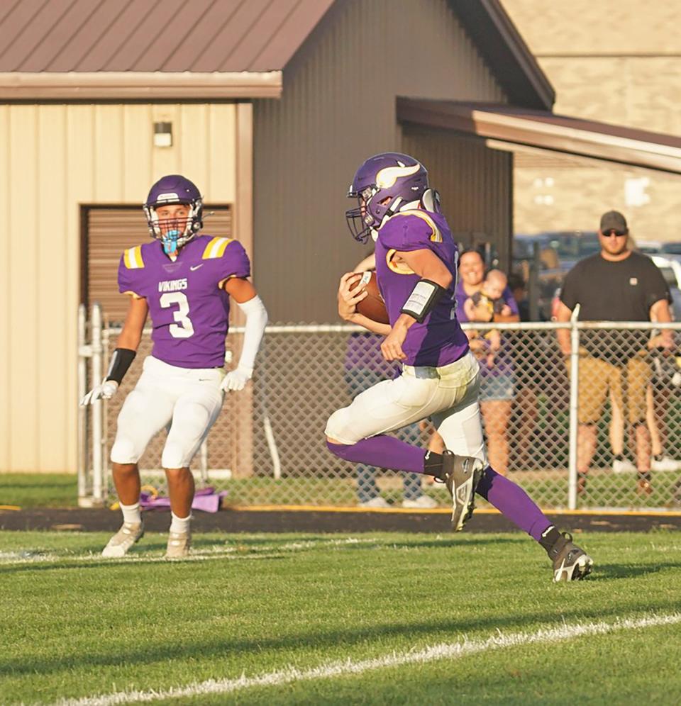 Bronson's Seth Withington breaks a long run on his way to a 200 yard, three touchdown performance Friday versus Prairie Heights