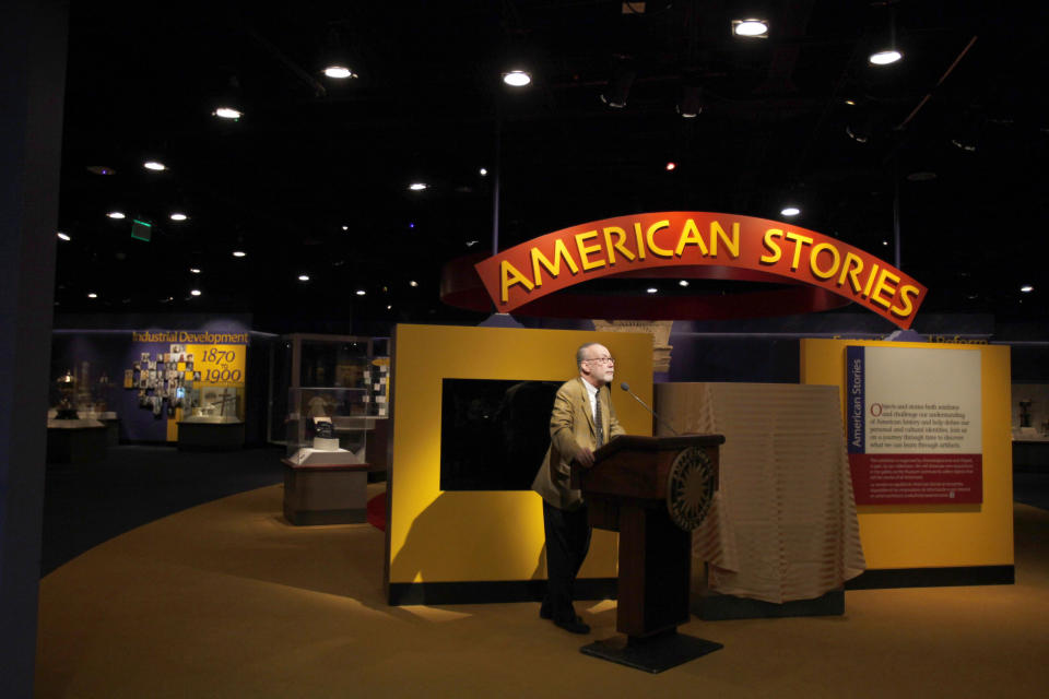 Marc Pachter, interim director of the Smithsonian National Museum of American History, speaks during a press preview of the new exhibit, "American Stories," at the museum in Washington, Wednesday, April 11, 2012. The National Museum of American History will open a new exhibit featuring iconic objects from pop culture along with objects dating back to the Pilgrims' arrival in 1620. "American Stories" will be a new chronology of U.S. history from the first encounters of Europeans and Native Americans to the 2008 presidential election. (AP Photo/Jacquelyn Martin)