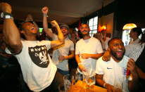 <p>Fans at the Lord Raglan pub in London celebrate England’s victory.<br>(Picture: PA) </p>