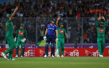 Cricket - England v Bangladesh - Second One Day International - Sher-e-Bangla Stadium, Dhaka, Bangladesh - 09/10/16. England's Jos Butler waits for the umpires decision. REUTERS/Cathal McNaughton