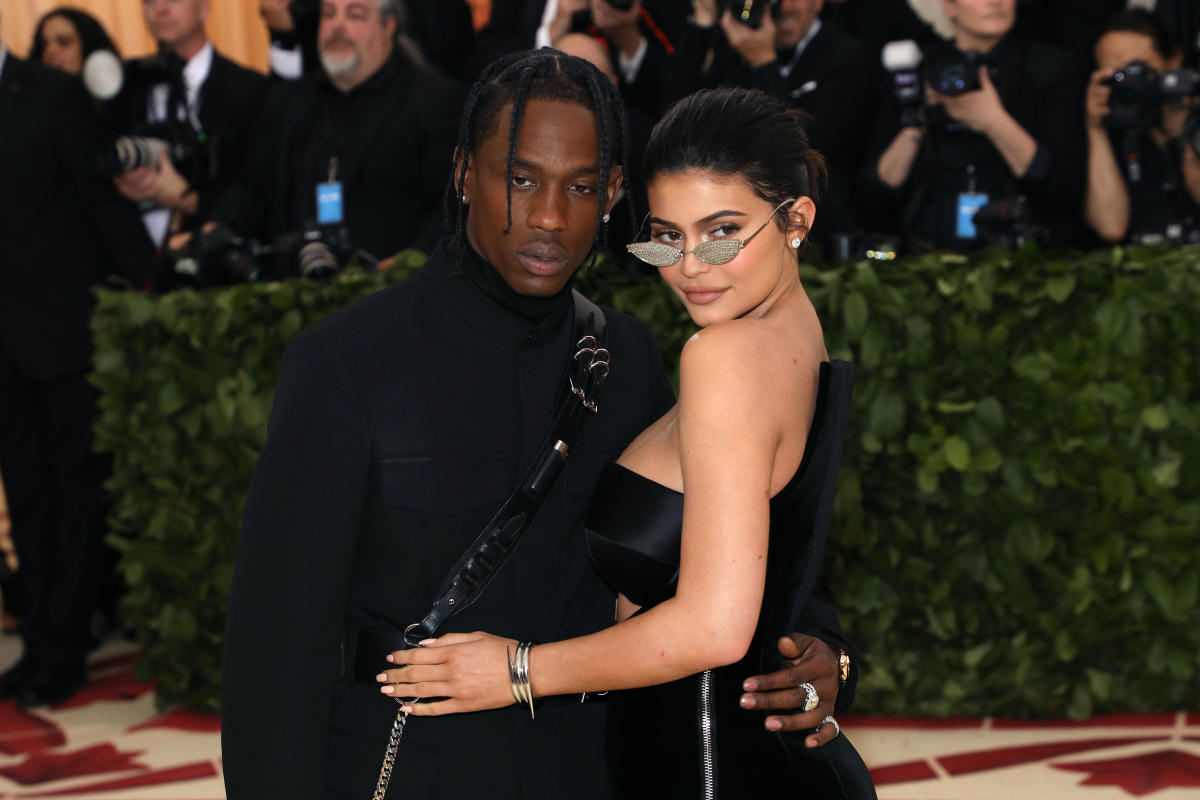 Kylie Jenner & Boyfriend Travis Scott Attend Louis Vuitton Fashion