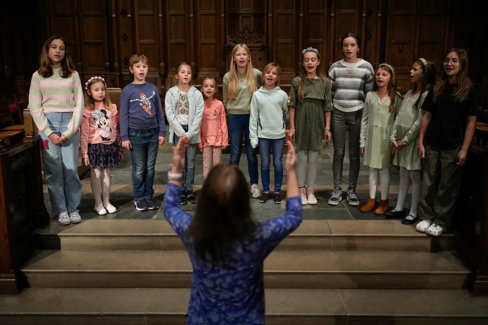 etiana Matviienko conducts the Ukranian Children's Choir during rehearsal for a benefit concert at First Congregational Church in downtown Columbus on Saturday. The concert comes at a time of uncertainty in U.S. government support for Ukraine.