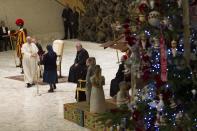 Pope Francis attends an audience with children assisted by volunteers of Santa Marta institute in Paul VI hall at the Vatican December 14, 2013. REUTERS/Giampiero Sposito (VATICAN - Tags: RELIGION)