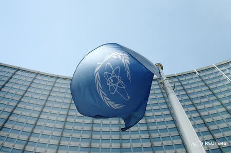 The flag of the International Atomic Energy Agency (IAEA) flies in front of its headquarters in Vienna, Austria, May 28, 2015. REUTERS/Heinz-Peter Bader/Files