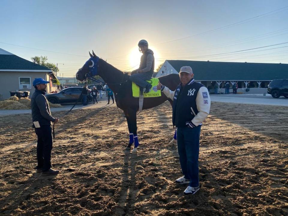 Dr. Ramon Tallaj stands with his colt, Sun Thunder, with jockey Brian Hernandez aboard.