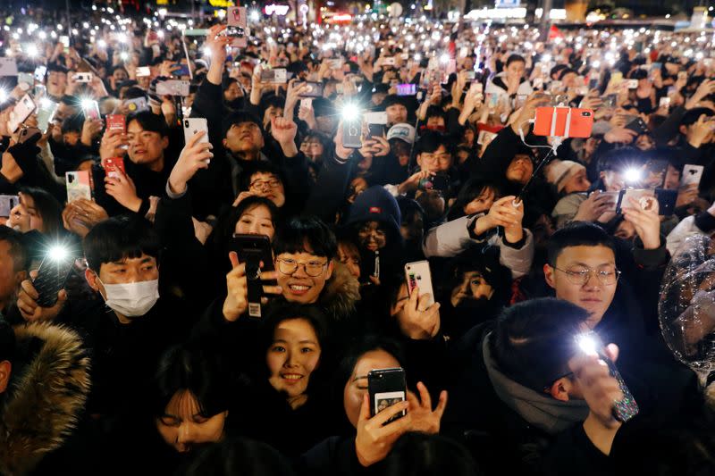 People attend a ceremony to celebrate the new year in Seoul