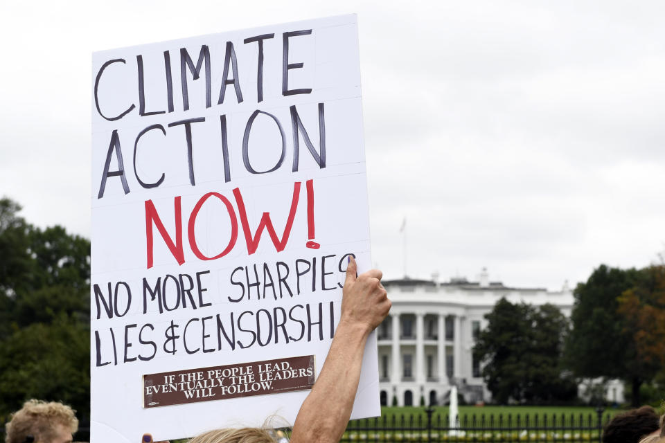 Activists protest during a rally outside the White House in Washington, Friday, Sept. 13, 2019. (AP Photo/Susan Walsh)