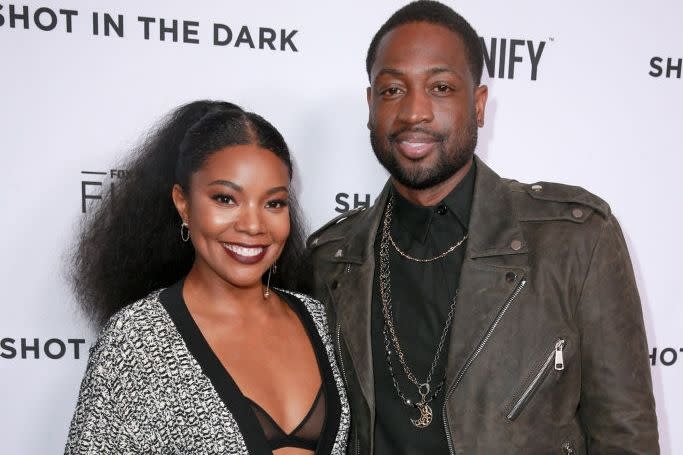 The Miami Heat star couldn't be with his son at the march, but wife Gabrielle Union was. Wade wrote on Instagram, "We support each other with pride!"