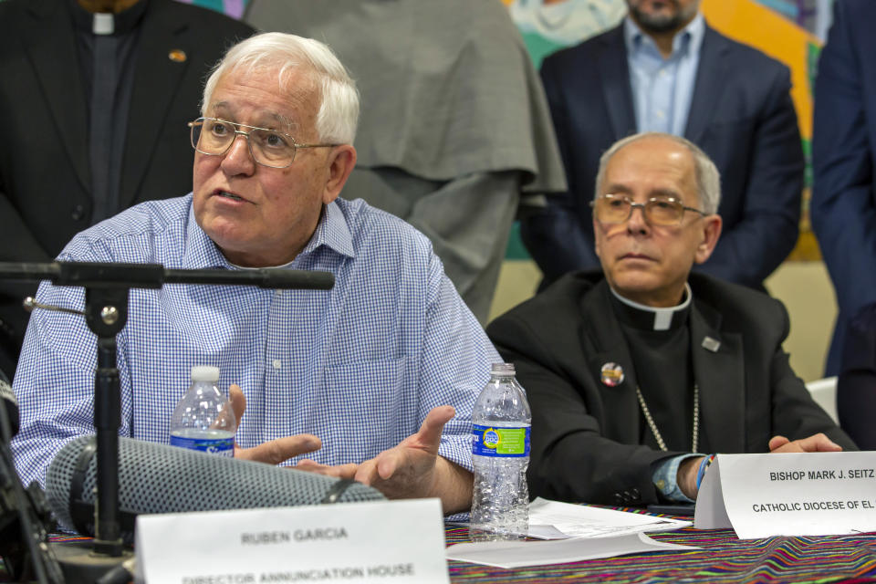 Ruben Garcia, founder and director of Annunciation House, a network of migrants shelters in El Paso, Texas, speaks during a news conference accompanied by Bishop Mark Seitz, Friday, Feb. 23, 2024. Garcia is reacting to the lawsuit filed by Texas Attorney General Ken Paxton that claims the Annunciation House "appears to be engaged in the business of human smuggling" and is threatening to terminate the nonprofit's right to operate in Texas. (AP Photo/Andres Leighton)