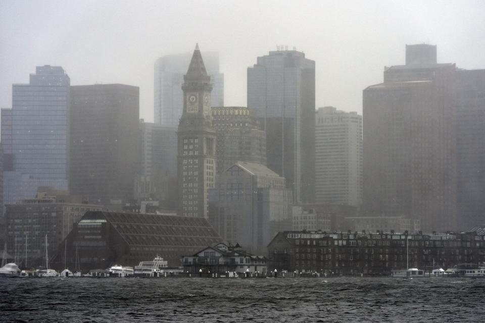 Rain and strong wind sweep across the harbor during a spring storm, Thursday, April 4, 2024, in Boston. (AP Photo/Michael Dwyer)