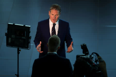 The Labour Party's Shadow Secretary of State for Departing the European Union Keir Starmer speaks to journalists at his party's conference in Liverpool, Britain, September 25, 2018. REUTERS/Hannah McKay