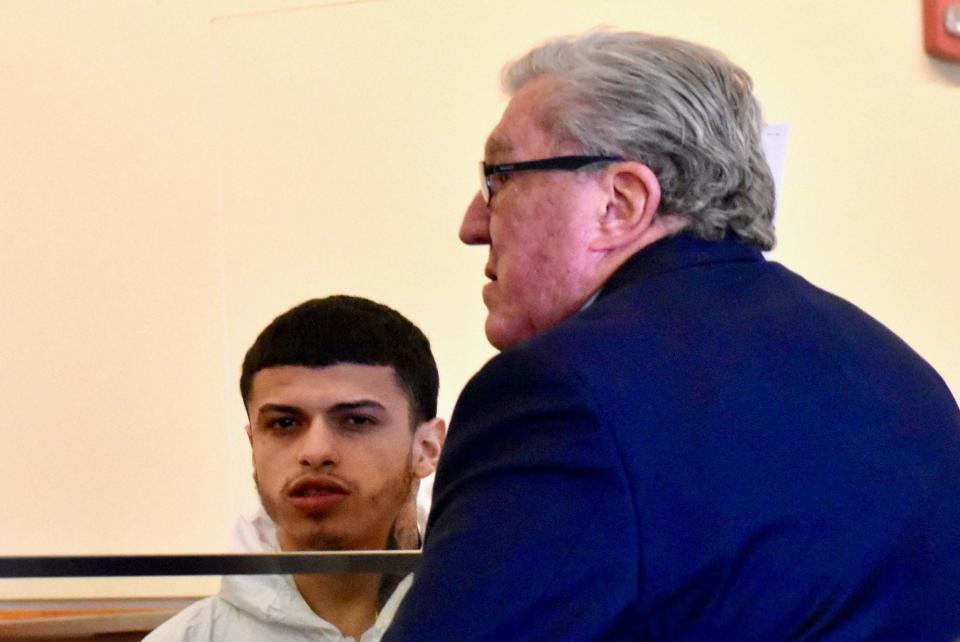 Jadyn Ortiz, 19, of Fall River, left, was charged with accessory to murder-after-the-fact in Fall River District Court Wednesday, March 20, in the fatal shooting of Colus Jamal Mills-Good on Rock Street in Fall River on March 14, 2024. He is seen here with his attorney, John Geary.
(Credit: Colin Furze)