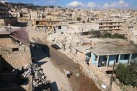 A general view shows damaged buildings in the town of Darat Azzah, west of the northern Syrian city of Aleppo, following reported bombings by government forces on October 7, 2015