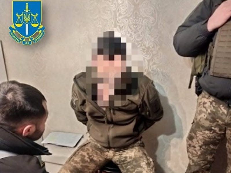 Ukrainian officials detained an army official accused of collaborating with and passing intelligence to Russians.