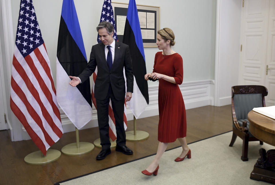 U.S. Secretary of State Antony Blinken, left, leads the way to Estonian Prime Minister Kaja Kallas on the occasion of their meeting, in Tallinn, Estonia, on Tuesday, March 8, 2022. Blinken was meeting with senior Estonian officials in Tallinn on Tuesday, a day after hearing appeals from both Lithuania and Latvia for more support and greater U.S. and NATO troop presence to deter a feared Russian intervention. (Olivier Douliery/Pool Photo via AP)