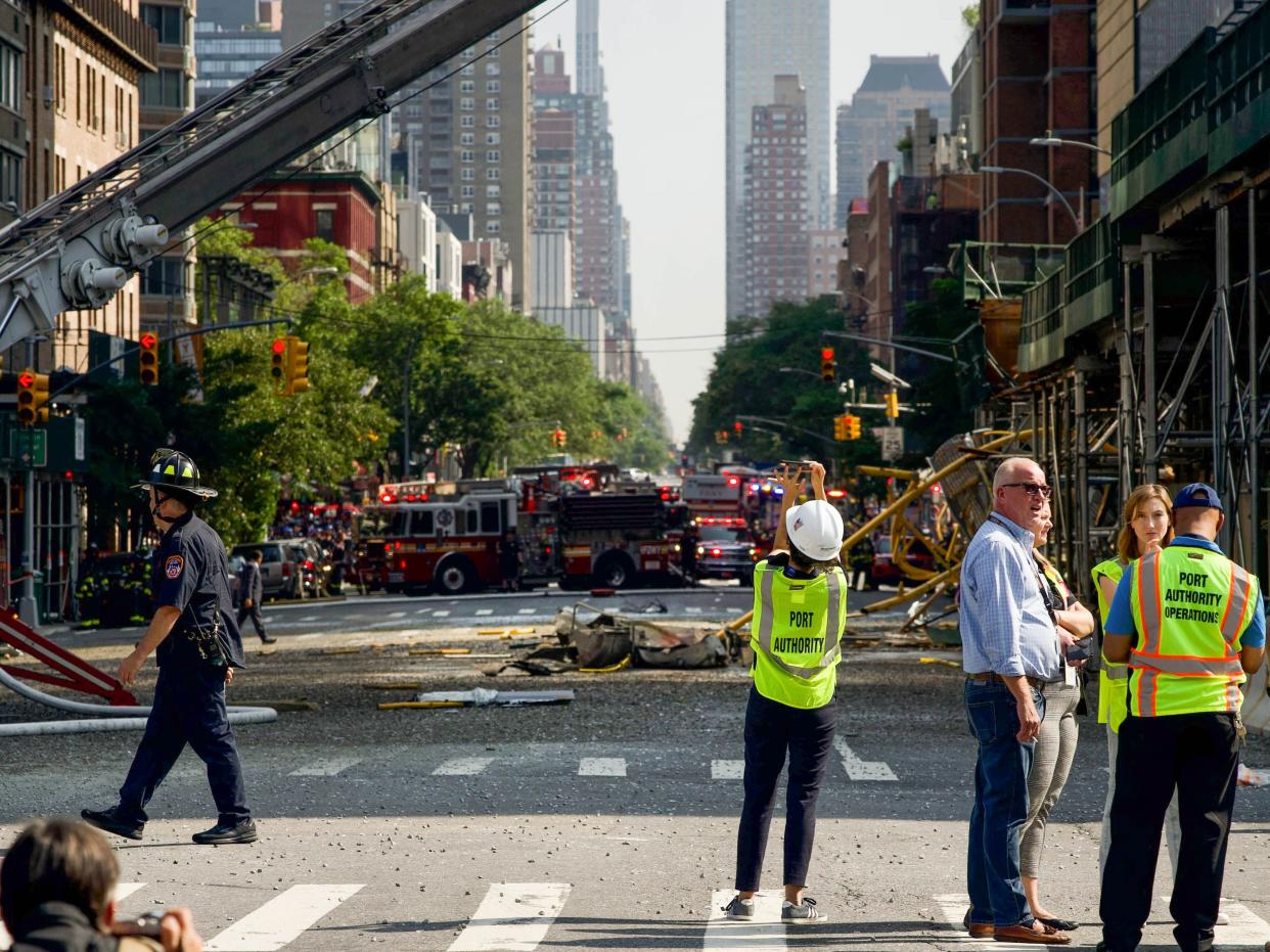 Debris from the construction crane that collapsed in Manhattan, New York lies on the street on 26 July (Ariana Baio / The Independent)