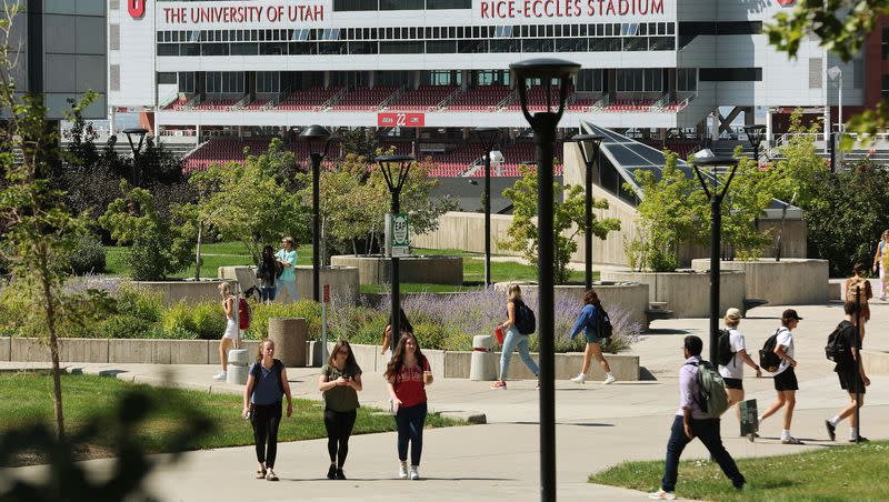 Students walk on the University of Utah campus in Salt Lake City on Tuesday, Aug. 23, 2022.