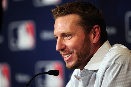 Roy Halladay announces his retirement the MLB Winter Meetings at Walt Disney World Swan and Dolphin Resort. David Manning-USA TODAY Sports