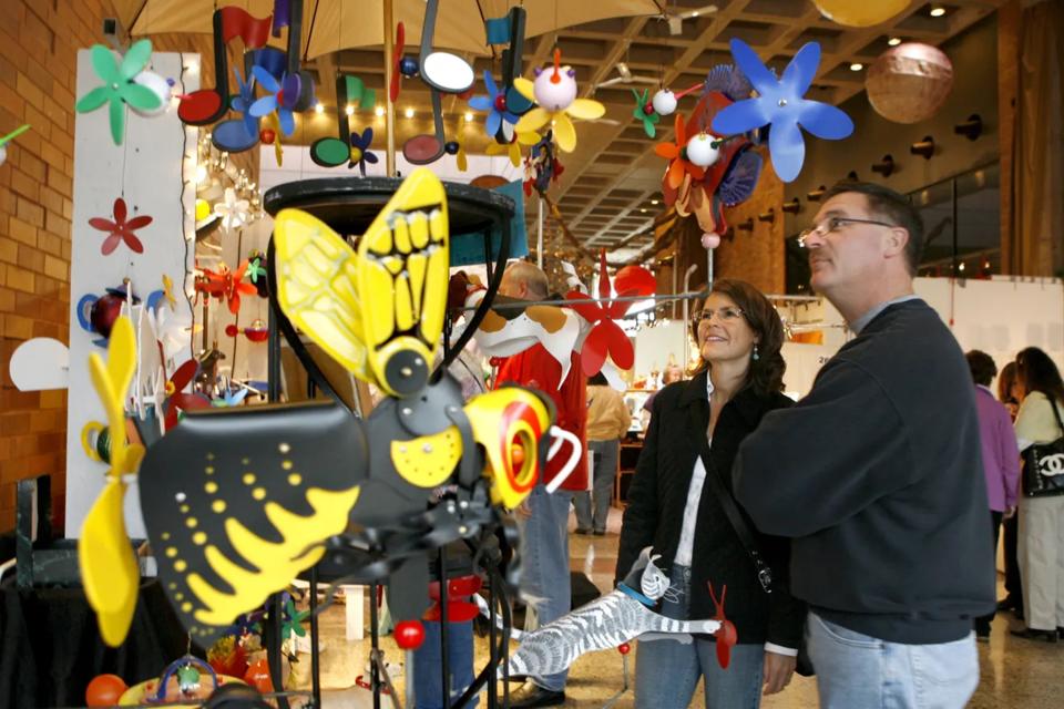 An artist and vendor is shown at the Christkindl Markt in 2009. The juried fine arts and crafts show is marking its 50th anniversary at this weekend's event.