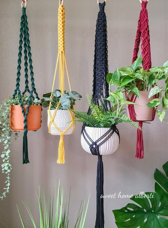 <p><a href="https://go.redirectingat.com?id=74968X1596630&url=https%3A%2F%2Fwww.etsy.com%2Flisting%2F900266235%2Fplant-hangers-in-bold-colors-macrame&sref=https%3A%2F%2Fwww.goodhousekeeping.com%2Fhome-products%2Fg43784546%2Fbest-indoor-hanging-planters%2F" rel="nofollow noopener" target="_blank" data-ylk="slk:Shop Now;elm:context_link;itc:0;sec:content-canvas" class="link ">Shop Now</a></p><p>Vibrant Plant Hangers</p><p>$42.50</p><p>etsy.com</p><span class="copyright">SweetHomeAlberti</span>