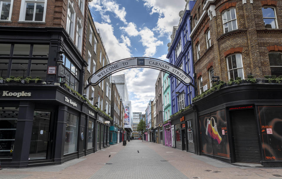 LONDON, May 12, 2020 -- Photo taken on May 12, 2020 shows closed shops in Carnaby Street in London, Britain. To support millions of jobs and businesses across Britain during the COVID-19 outbreak, the British government decided to extend the implementation of its Coronavirus Job Retention Scheme until the end of October, said a Treasury statement released Tuesday. (Photo by Han Yan/Xinhua via Getty)