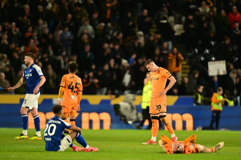 Both sets of players sunk to their knees after Saturday's pulsating game