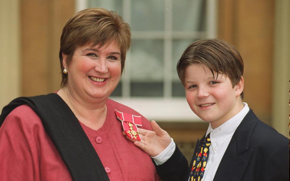 Jenni Murray with her son Charlie getting her OBE - Fiona Hanson/ PA