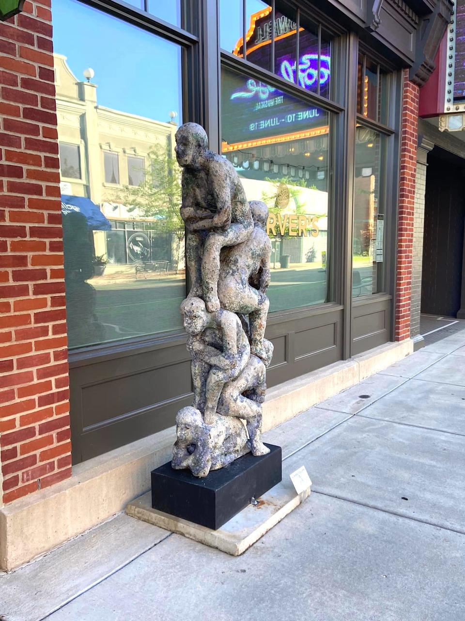 The sculpture "Human Column" created by Williamston artist Mark Chatterley, was a part of Adrian's 11th annual Outdoor Sculpture Exhibition. On Saturday, the $12,000 ceramic sculpture was smashed into several pieces. A suspect has confessed to vandalizing the sculpture, Adrian police said.