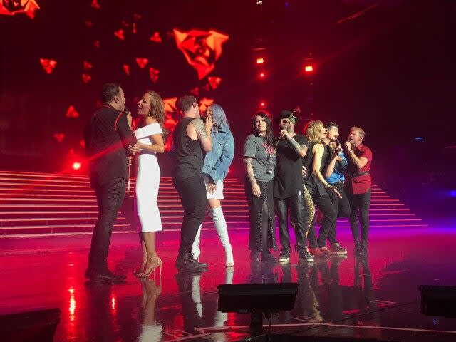 The singers sweetly escorted their gorgeous wives on stage during their final 'Larger Than Life' residency gig in Las Vegas.