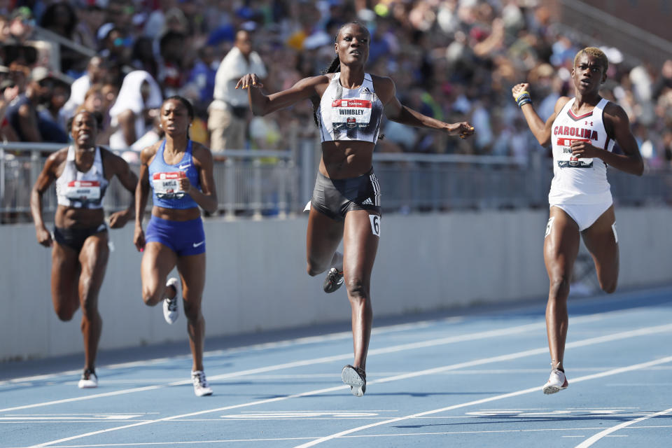 Shakima Wimbley crosses the finish line ahead of Wadeline Jonathas, right, while winning the women's 400-meter dash final at the U.S. Championships athletics meet, Saturday, July 27, 2019, in Des Moines, Iowa. (AP Photo/Charlie Neibergall)