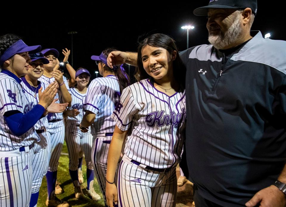 Shadow Hills' Ximena Arizaga embraces head coach JT Tiumalu after their game at Shadow Hills High School in Indio, Calif., Thursday, April 18, 2024.