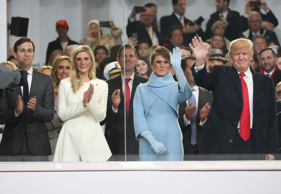 WASHINGTON, DC - JANUARY 20: U.S. President Donald Trump (R), stands with his wife first lady Melania Trump, daughter Ivanka Trump and her husband Jared Kushner, inside of the inaugural parade reviewing stand in front of the White House on January 20, 2017 in Washington, DC. Donald Trump was sworn in as the nation's 45th president today.  (Photo by Mark Wilson/Getty Images)