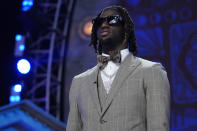 LSU wide receiver Brian Thomas Jr. walks on stage during the first round of the NFL football draft, Thursday, April 25, 2024, in Detroit. (AP Photo/Jeff Roberson)