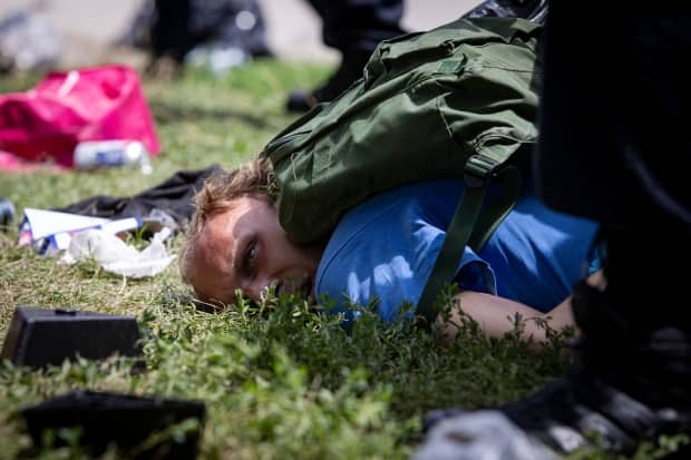 People living in an encampment at Lamport Stadium, in downtown Toronto, faced forceable eviction by order of the city on July 21, 2021.  (Evan Mitsui/CBC - image credit)