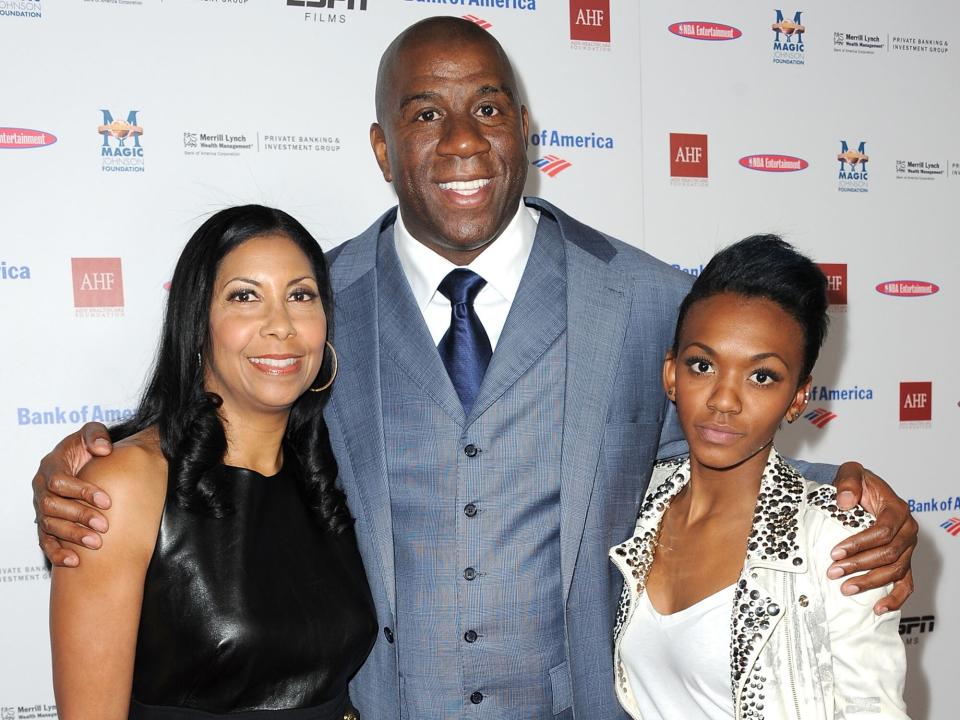 Cookie Johnson, Earvin "Magic" Johnson and Elisa Johnson arrive at the premiere of ESPN Films' "The Announcement" at Regal Cinemas L.A. Live on March 6, 2012 in Los Angeles, California