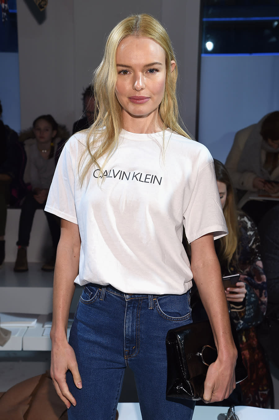 <p>Kate Bosworth wore a simple white T-shirt emblazoned with the label’s new logo to the star-studded show. (Photo: Getty Images) </p>